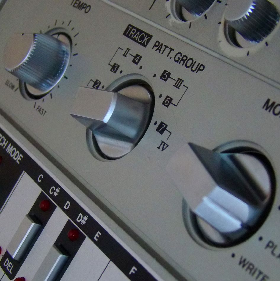 Close detail of the Roland TB-303 tempo, pattern group, mode and pitch-entry controls