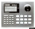Monochrome close view of the DR-550 MkII display, rotary dial and performance pads; original archive watermark retained.