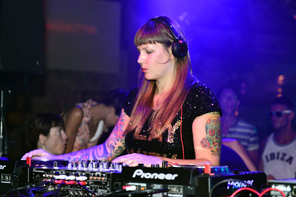 Miss Kittin on the decks in Ibiza in 2012, photographed by Amnesia Ibiza.