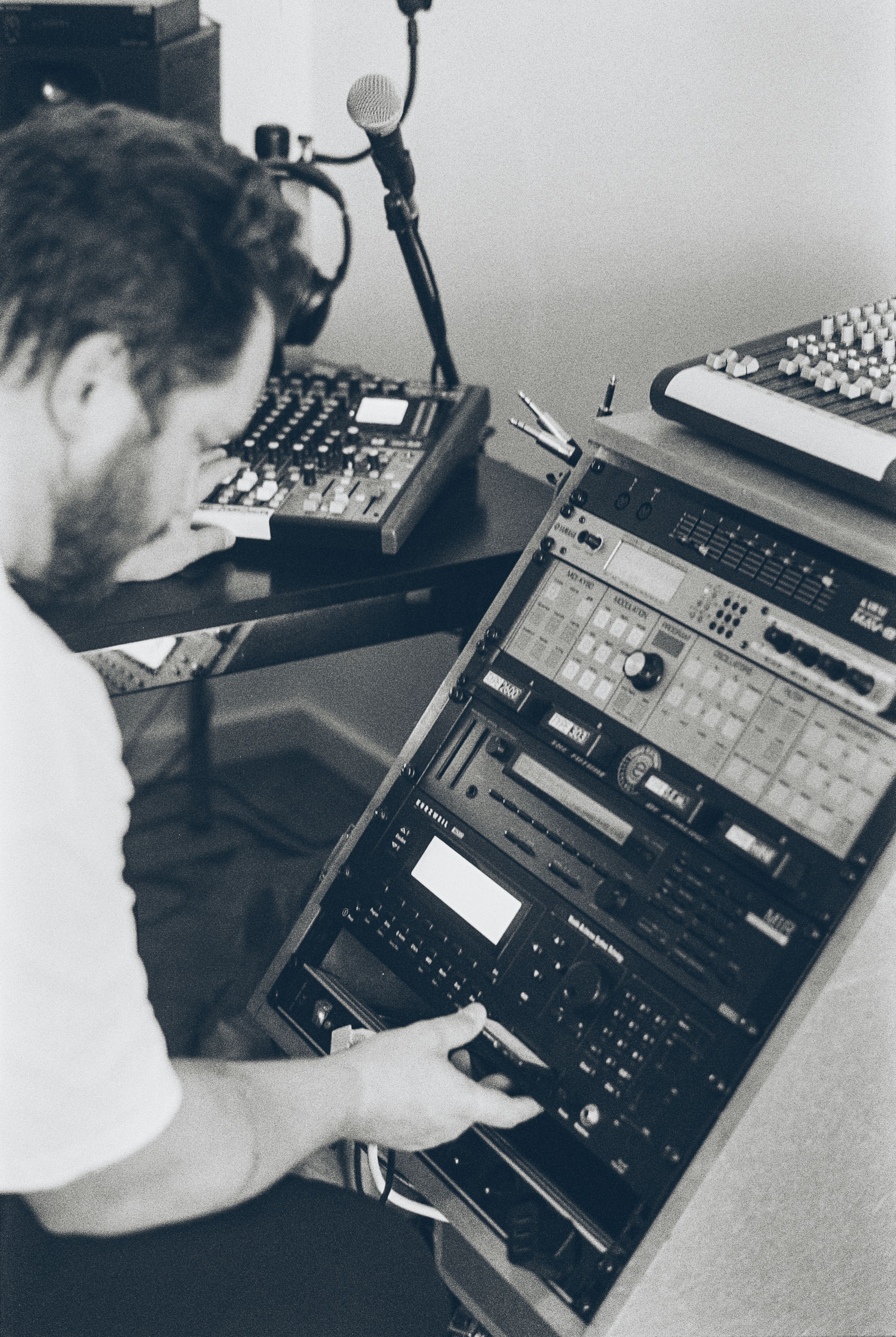 Romain FX photographed in a rack-based studio setting for 15 Questions.