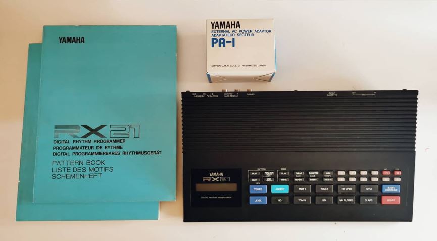 Adam de Paor-Evans’s Yamaha RX-21, its pattern book and PA-1 adaptor.
