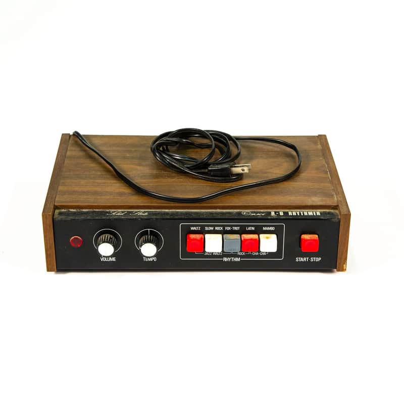 Kay R-8 Rhythmer from Moby’s collection: wooden case, two knobs, selector keys and red Start/Stop key.